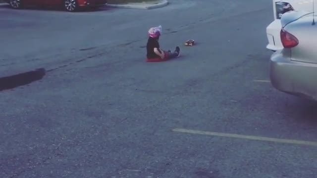 Collab copyright protection - little girl skateboard pink helmet