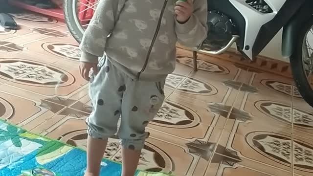Video clip baby singing very happily