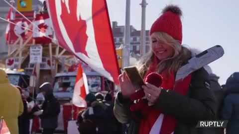 CANADA: FREEDOM CONVOY PROTESTS CONTINUE IN OTTAWA AS POLICE THREATEN ARRESTS