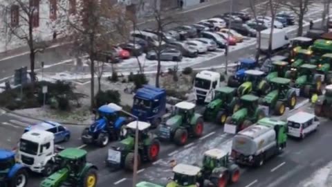 German farmers block roads with tractors in protest against plan to scrap diesel tax breaks.