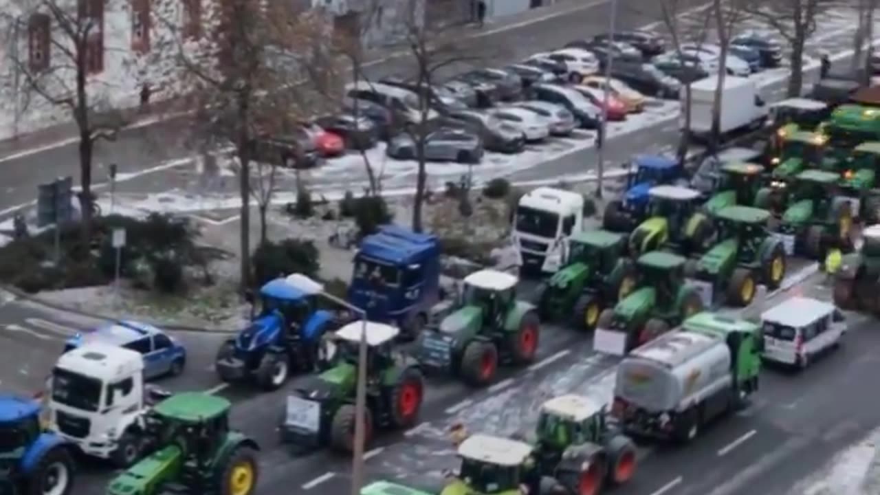 German farmers block roads with tractors in protest against plan to scrap diesel tax breaks.