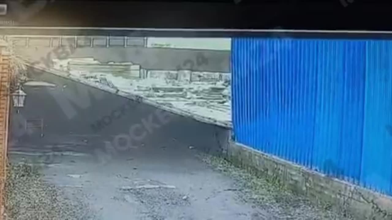 Strong powerful winds toppled a building wall?