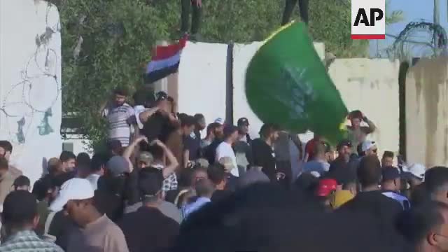 Protesters storm parliament building in Baghdad