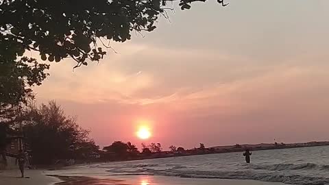 Play on the ebbing beach