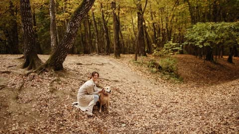 Wide Angle Shot of a Woman with her Dog