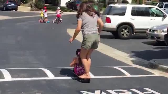 Mom and Daughter Crash HARD After Attempting Gnarly Tandem Skateboard Trick