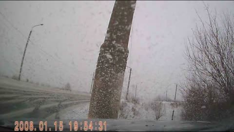 Sliding Truck Nearly Hits Car