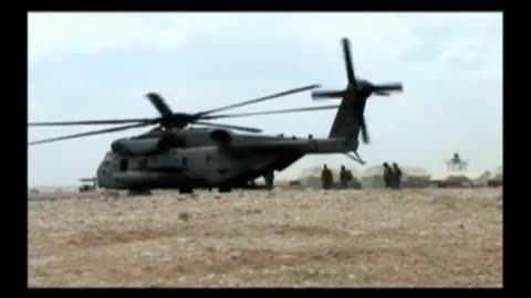 Marine Helicopter in Afghanistan lifts mine roller