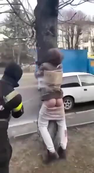 Ukraine: Ukraine nationalists beat and cane man tied to tree