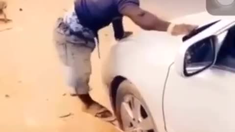 A car engineer suddenly fell down from spinner