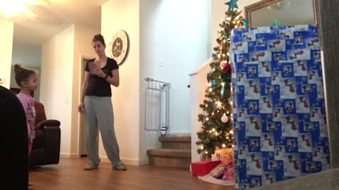 Little Girl Unwraps Military Dad