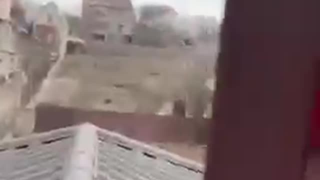 The moment of impact of the missile on an apartment building in Nikolaev.