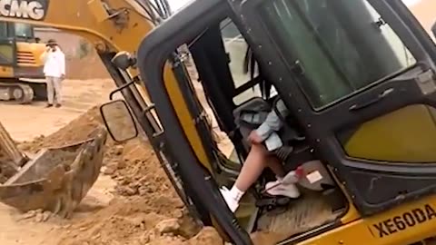 WOW!! Lady Rescues Excavator