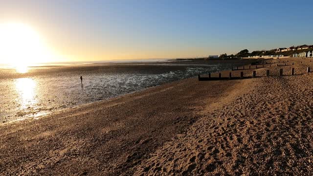 Panoramic shot at a beach. at sunset