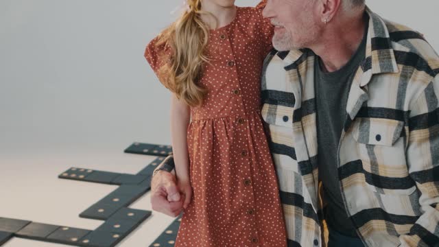 Little Girl with Her Grandfather