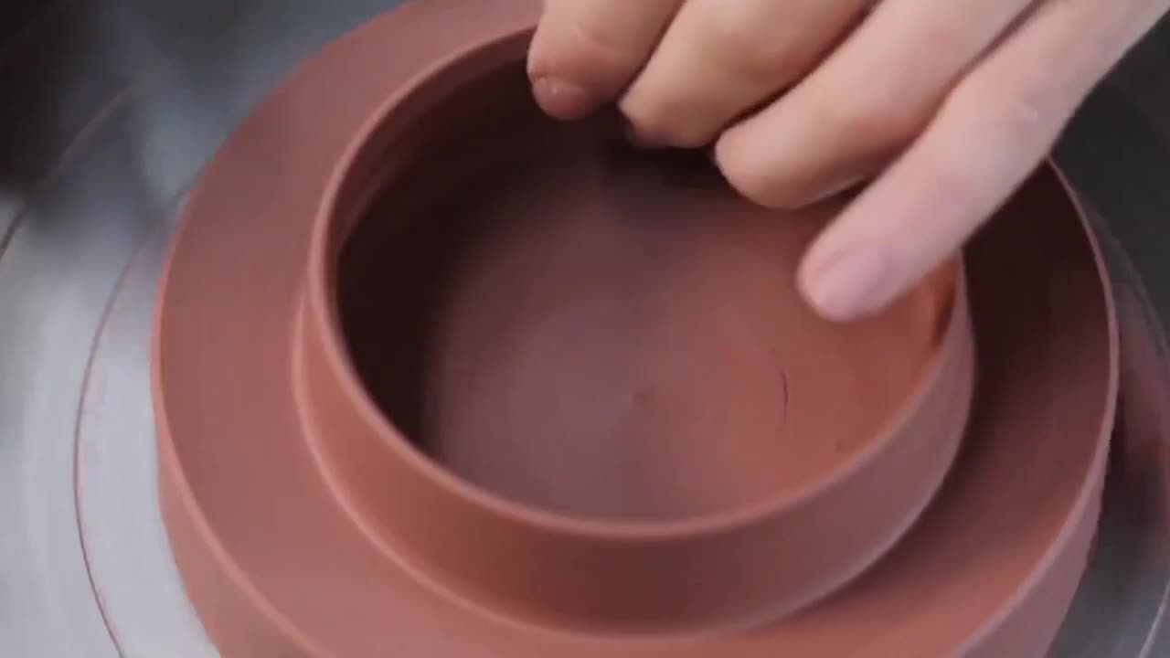 The Making Of The Inner Wall Of Pottery Pot