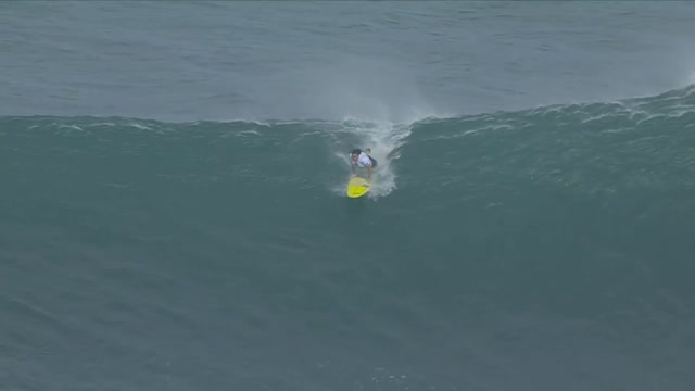 Look at these crazy surfers