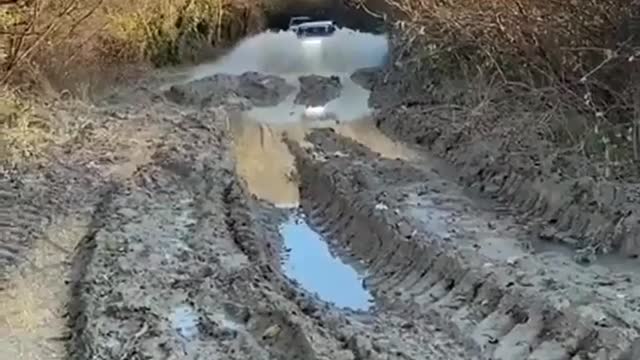 Car stuck in mud