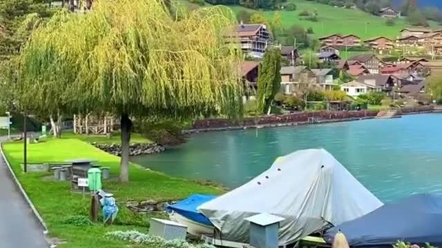 Switzerland Walking by Lake Brienz.