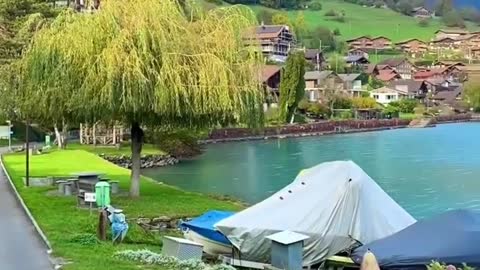 Switzerland Walking by Lake Brienz.