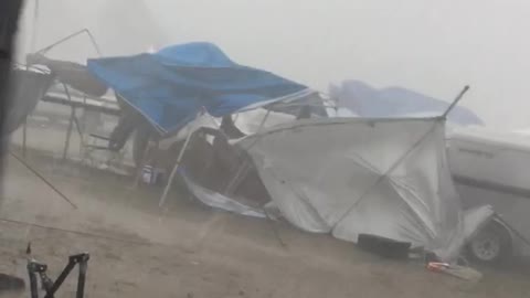 Torrential Downpour Hits Powwow