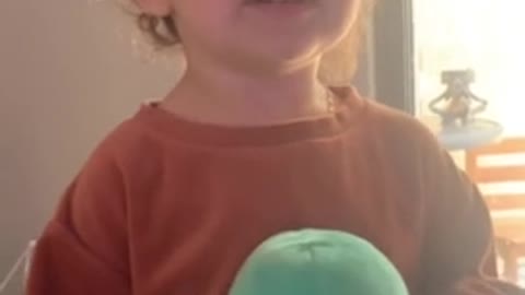 Littele girl delightfully mispronounces the word