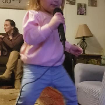 Toddler getting down to Prince "kiss"
