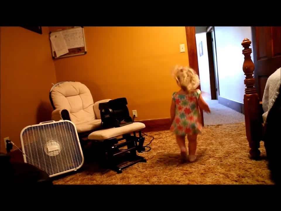 Crazy toddler screams each time she runs through fan