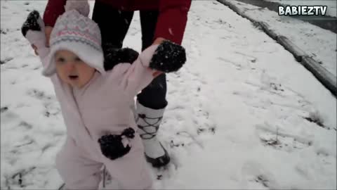 Cute Babies Playing in the snow.First Time.So cute.