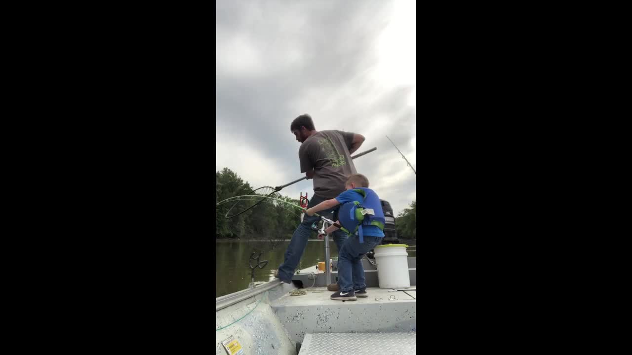 Happy Kid Catches Huge Fish