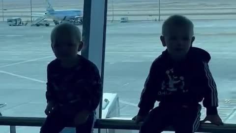 Kids fall off bannister at the exact same time