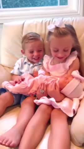 Little Kids Holding Baby Sister for the First Time
