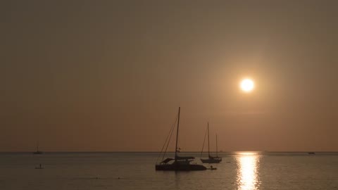 Sea horizon with boats