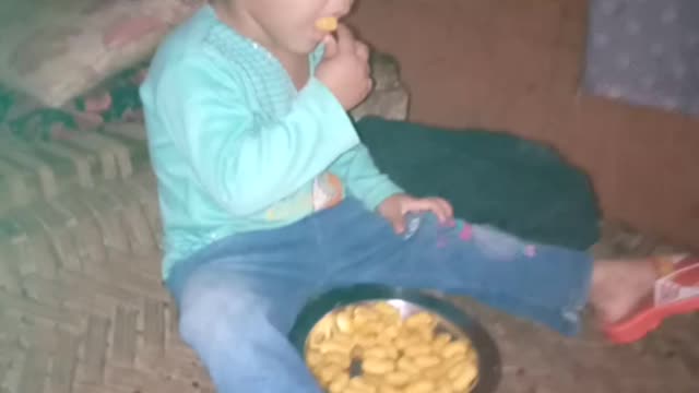 My daughter eating a CHIPS