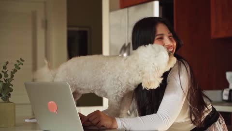 A Woman Petting a Dog--FH