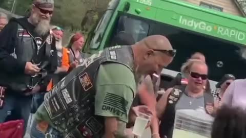 Bikers stop at a Lemonade stand