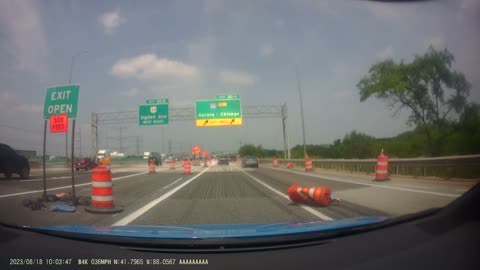 SUV Crashes Into Construction Cones While Trying to Exit Highway