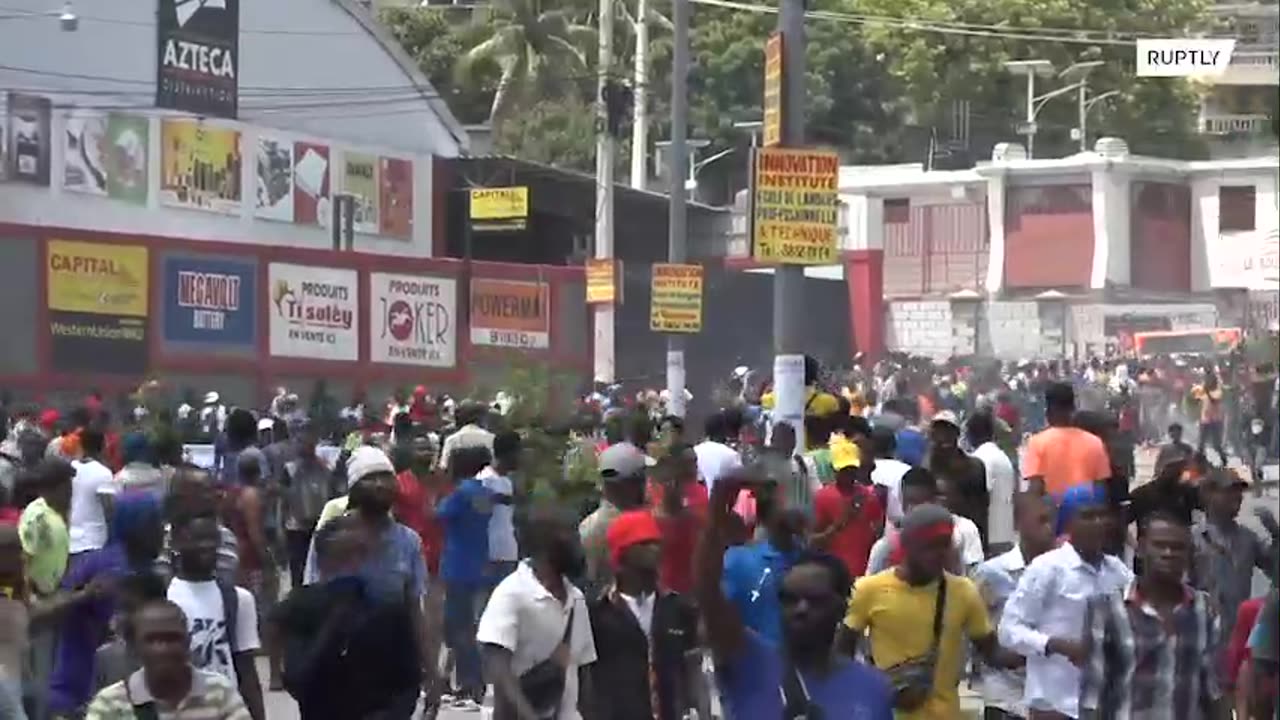 Riot police fires tear gas as mass protests hit Port-au-Prince