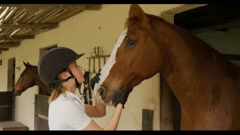 Caucasian woman with her horse