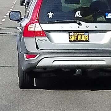 Car license plate reads "srf hugr"