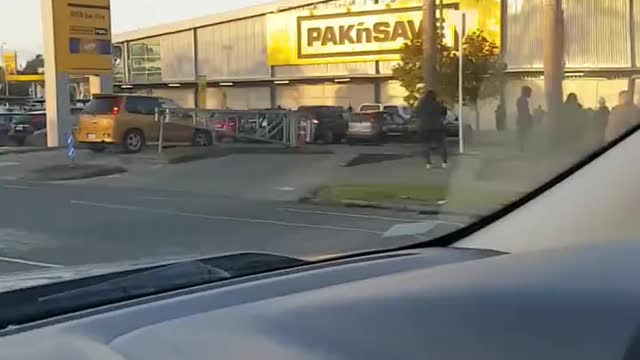 People Line the Block to Enter Store