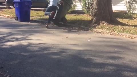 Guy running into trashcan