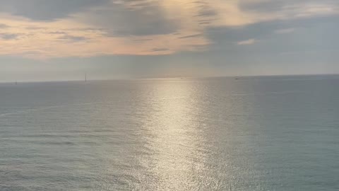 the beach of Jeju Island at sunset