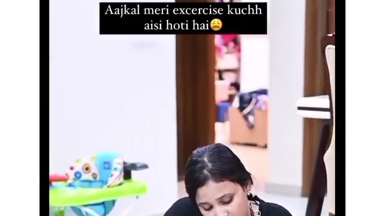 A naughty baby playing with his mother