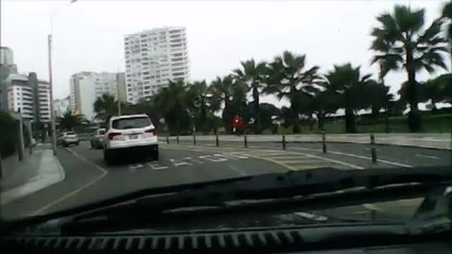 Driving Around Miraflores, Lima Peru alongside the coast in a cold, grey day of july 2021