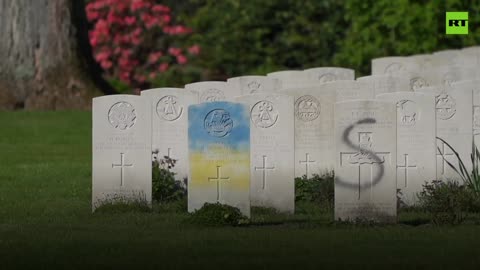 RT. War cemetery in Netherlands sprayed with swastikas & Ukraine flags