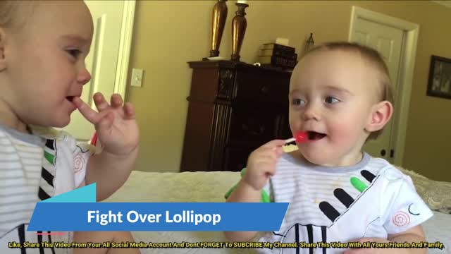 Twin Babies Fight Over Lollipop