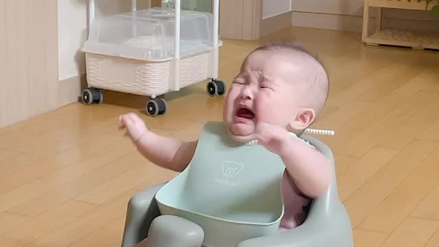 Baby crying at mom and dad's question