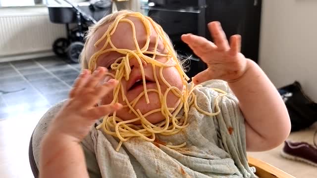 Baby Pours Plate of Pasta Straight Onto Her Face