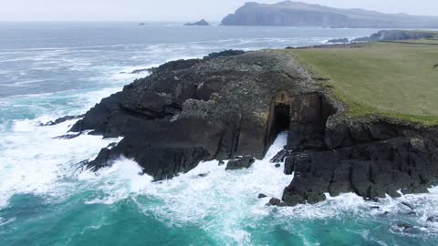 Strong water hitting the rocks - open sea